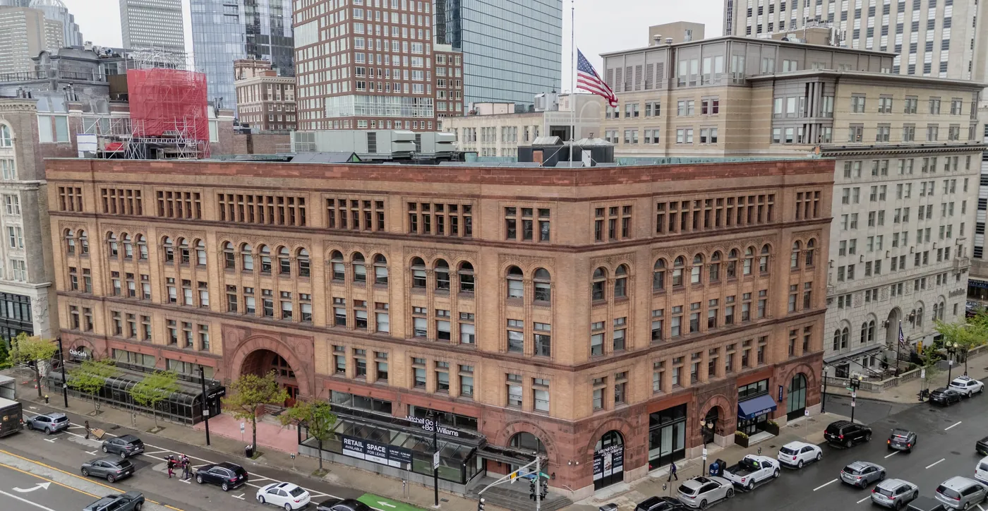 The brick and brownstone facade of the Youth's Companion Building in Boston