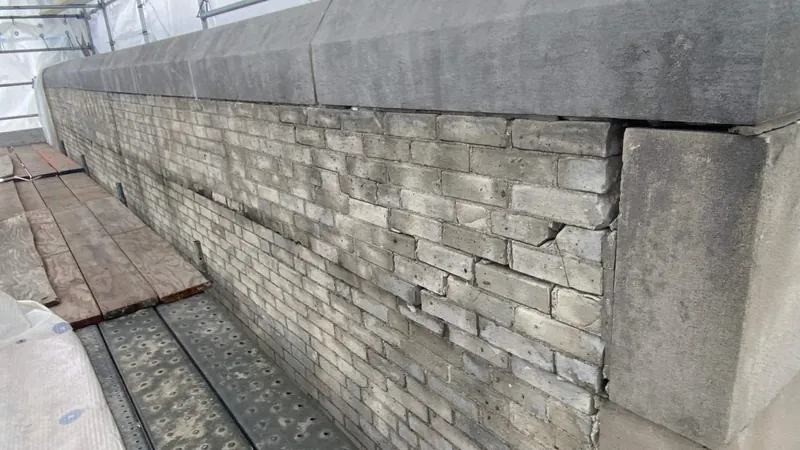 Original stone relaid over the new lintels
