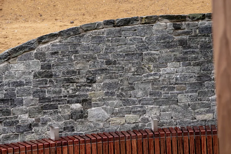 Coursing and cap detail on the veneer wall
